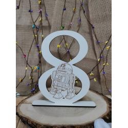 Единични цифри на стойка с любим герой